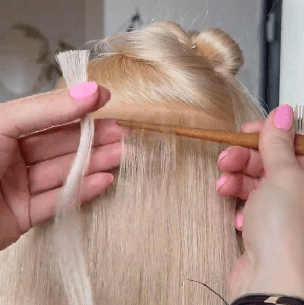 Hair extension course visual showing styled blonde hair